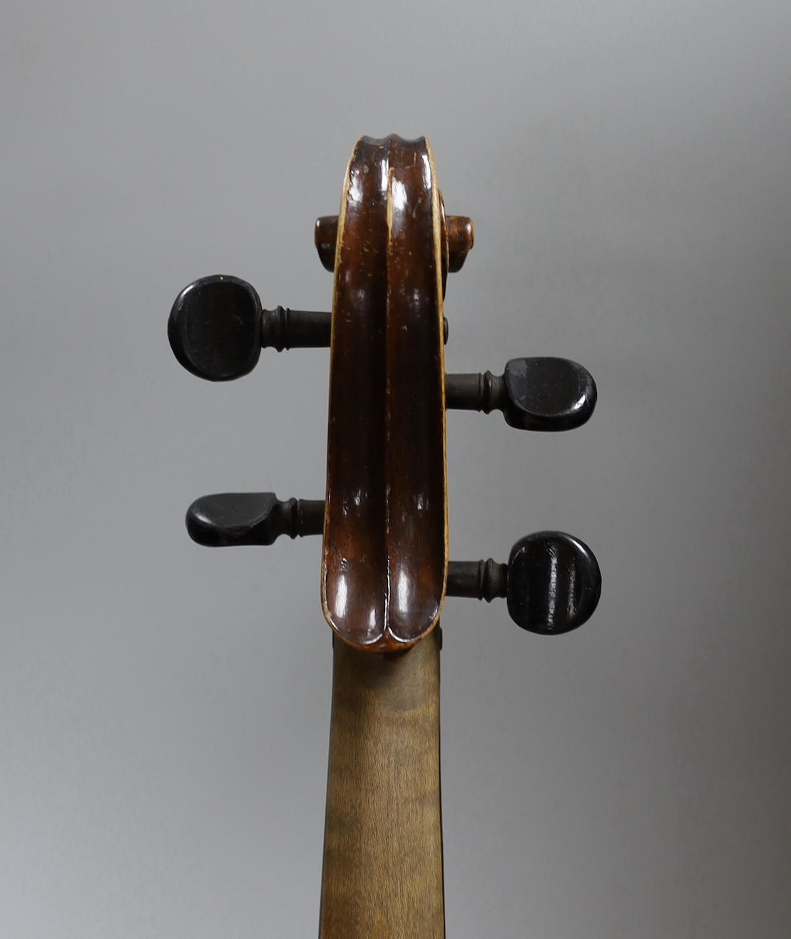 A Maidstone violin, with bow, cased. violin 59 cms high.